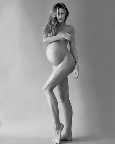 Pregnant star shows off her baby bump in stunning nude shoot